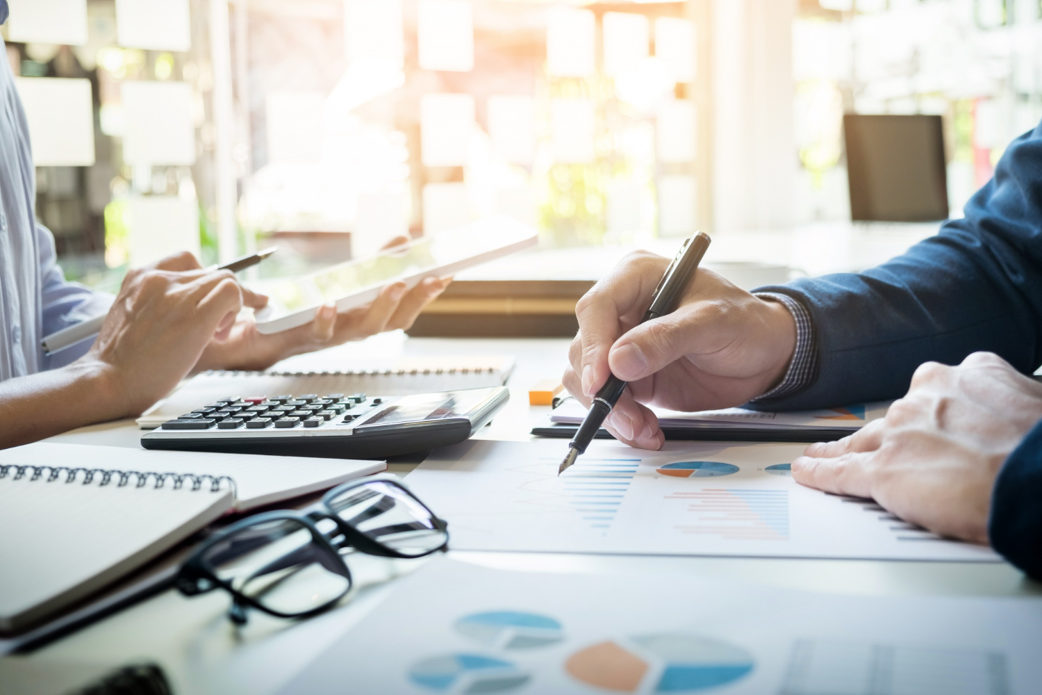 two persons doing bookkeeping